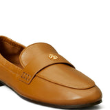 Close up of brown loafer, showing texture of the calf leather fabric