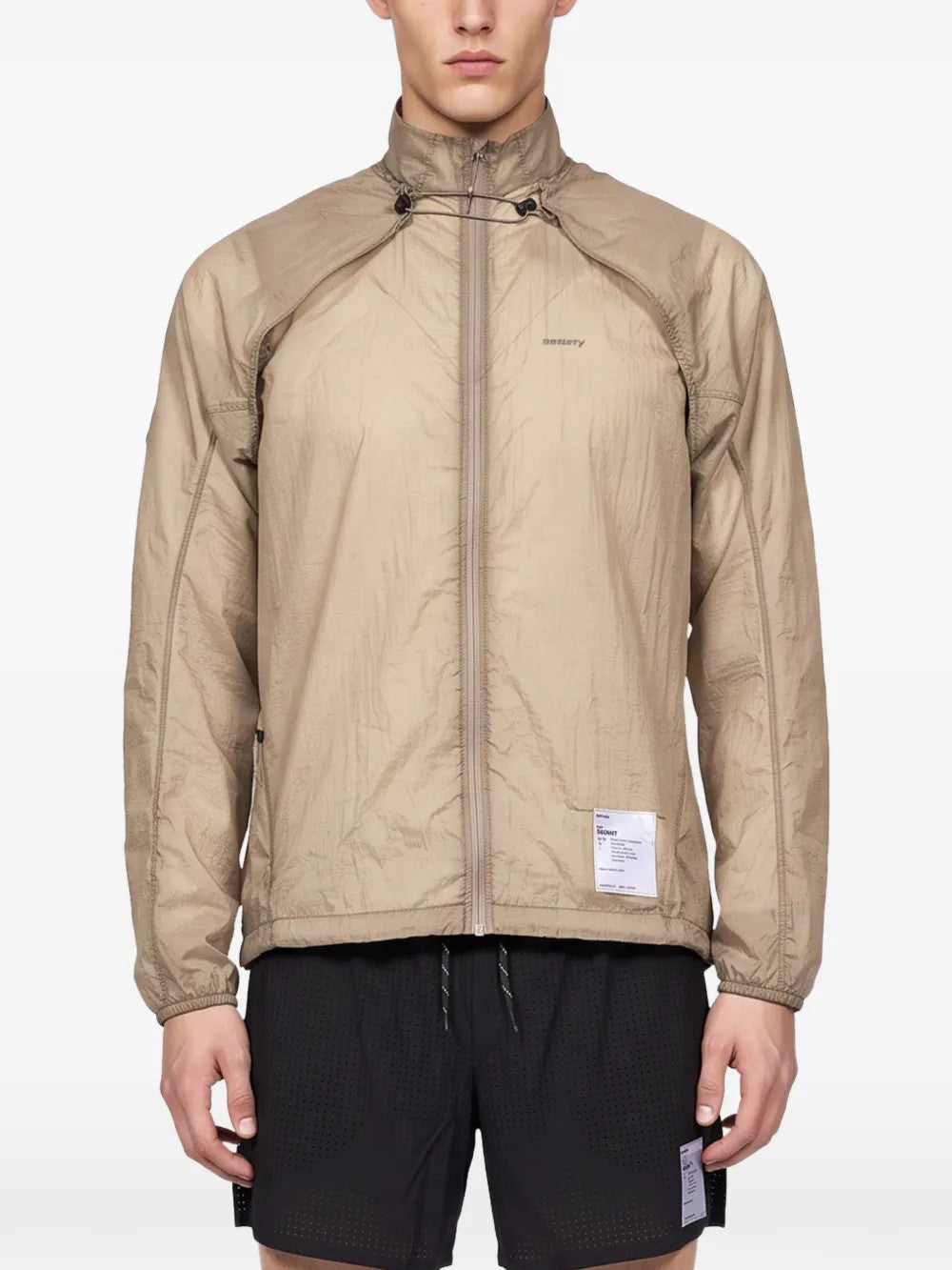 Tan jacket, full body view
