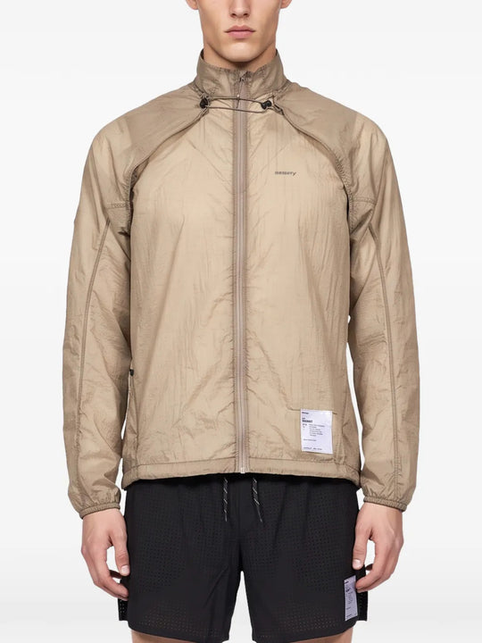 Tan jacket, full body view