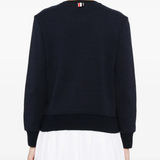 Navy sweata-hoodies worn by a person, showing the sweats-hoodies fit