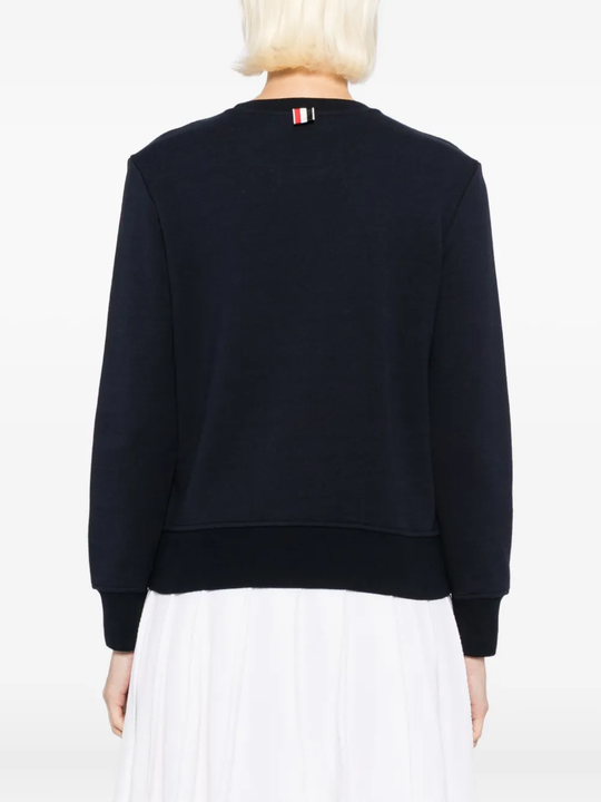 Navy sweata-hoodies worn by a person, showing the sweats-hoodies fit