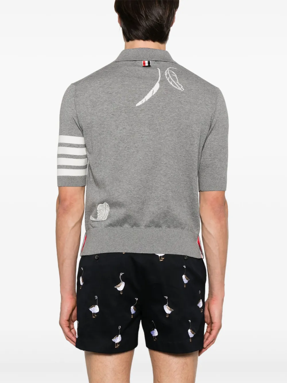 Grey shirt worn by a person,showing the shirt's fit