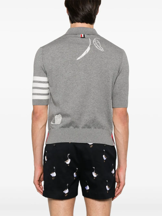 Grey shirt worn by a person,showing the shirt's fit