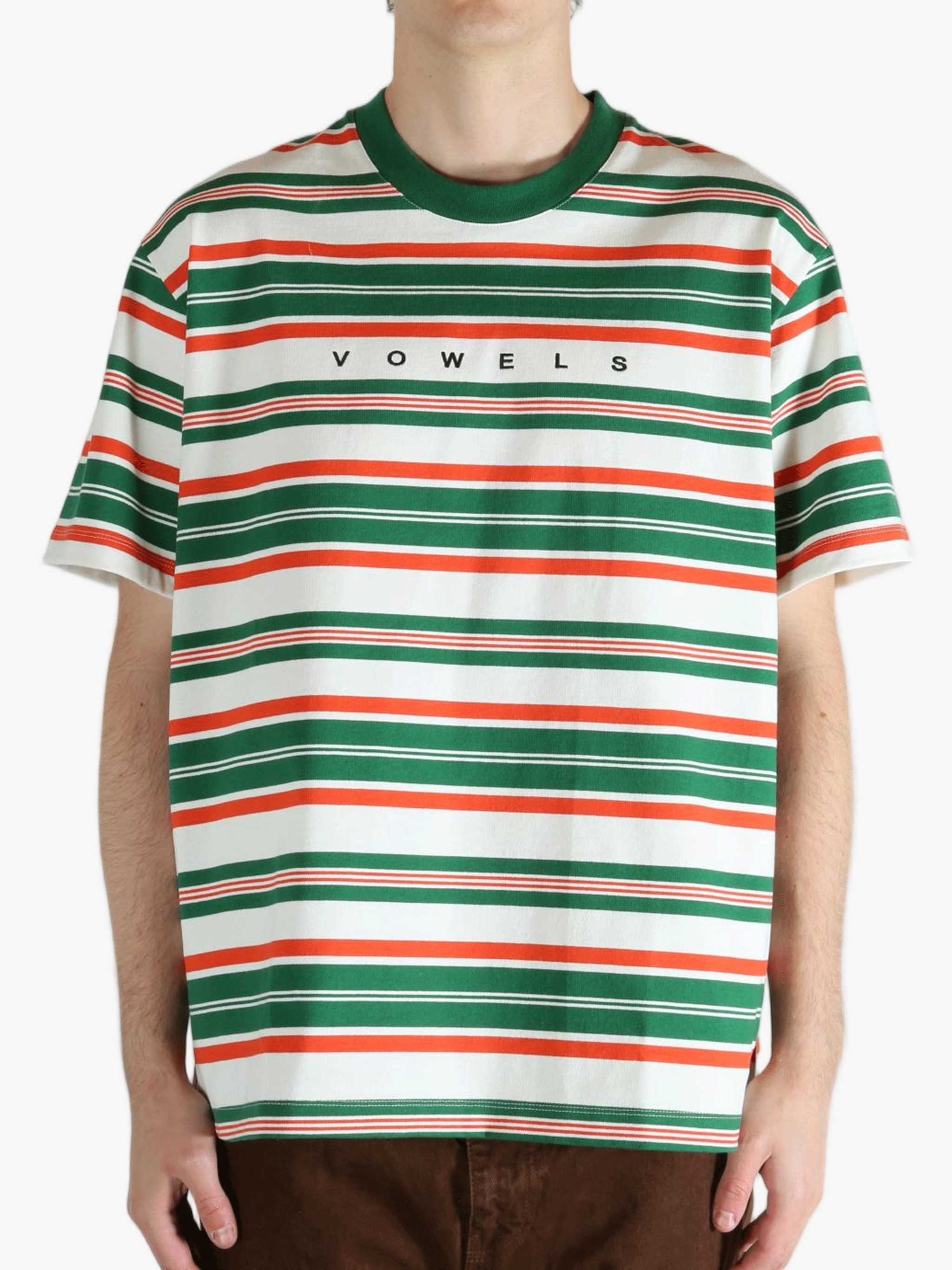 Green t-shirt worn by a person, showing the t-shirt's fit
