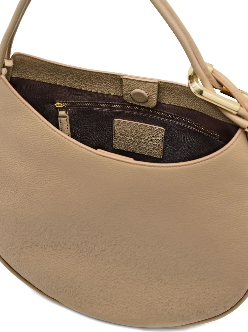Close up of the tan bag, showing texture of the leather fabric