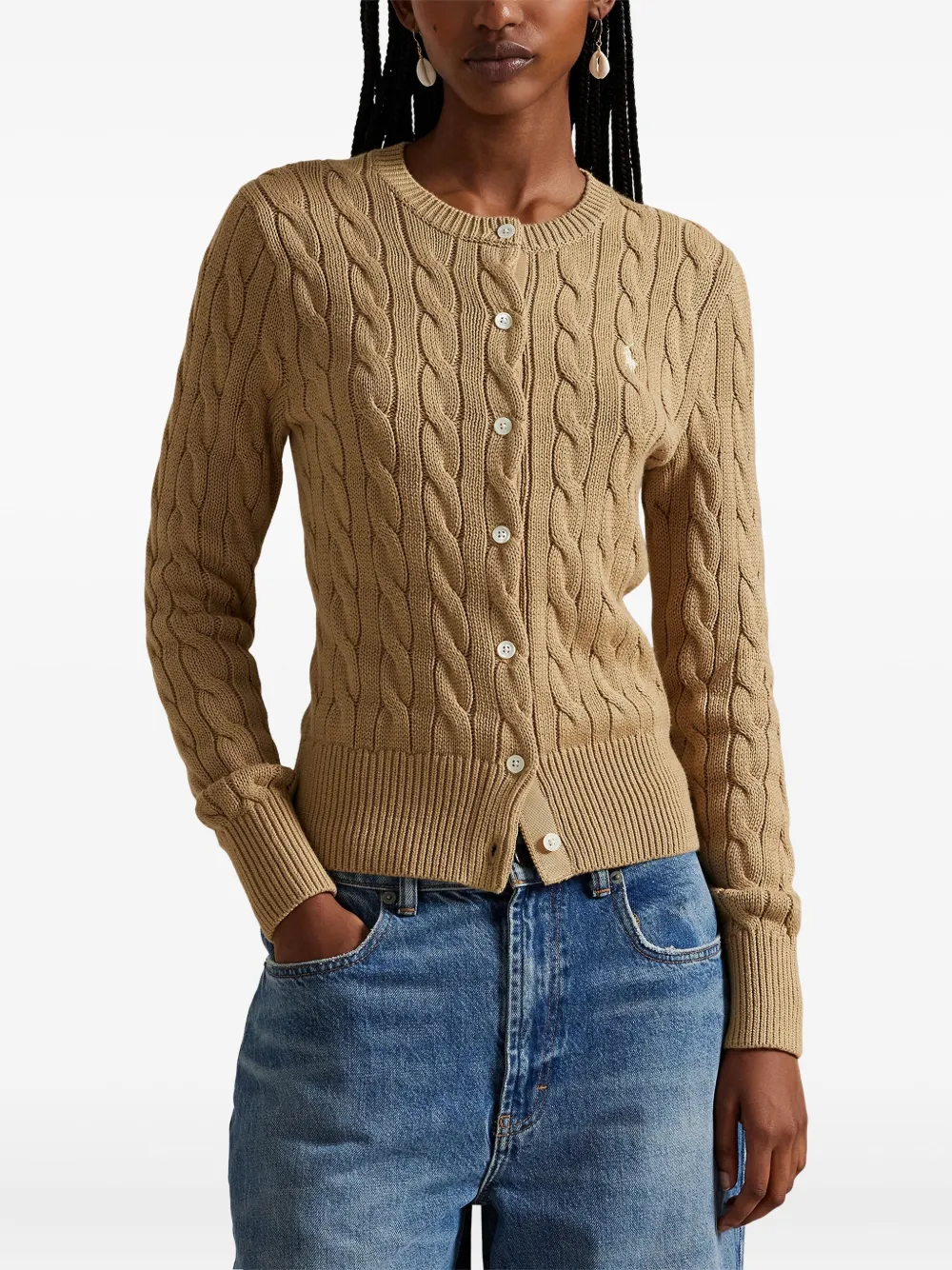 Brown cardigan worn by a person, showing the cardigan's fit