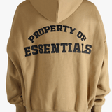 Brown hoodie worn by a person, showing the hoodie's fit