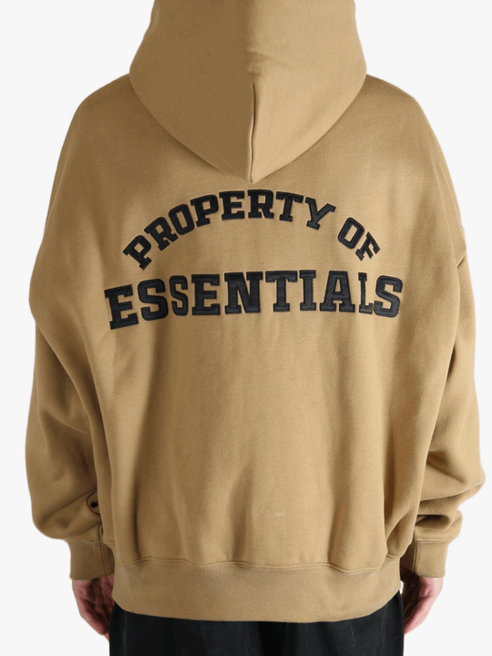 Brown hoodie worn by a person, showing the hoodie's fit