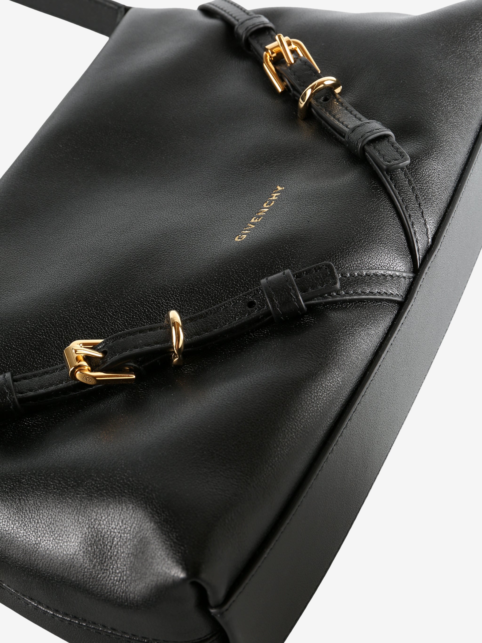 Close up of black bag,showing texture of the leather fabric.