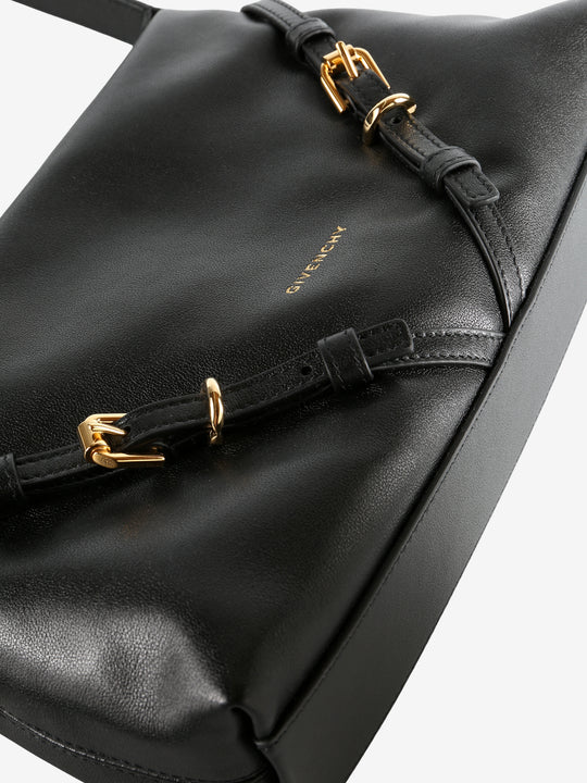 Close up of black bag,showing texture of the leather fabric.