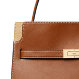 Close up of brown leather handbag,showing texture of the leather fabric