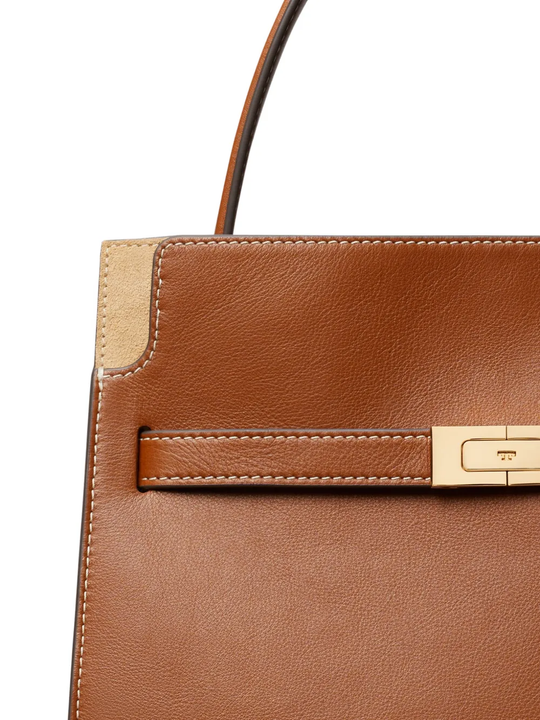 Close up of brown leather handbag,showing texture of the leather fabric