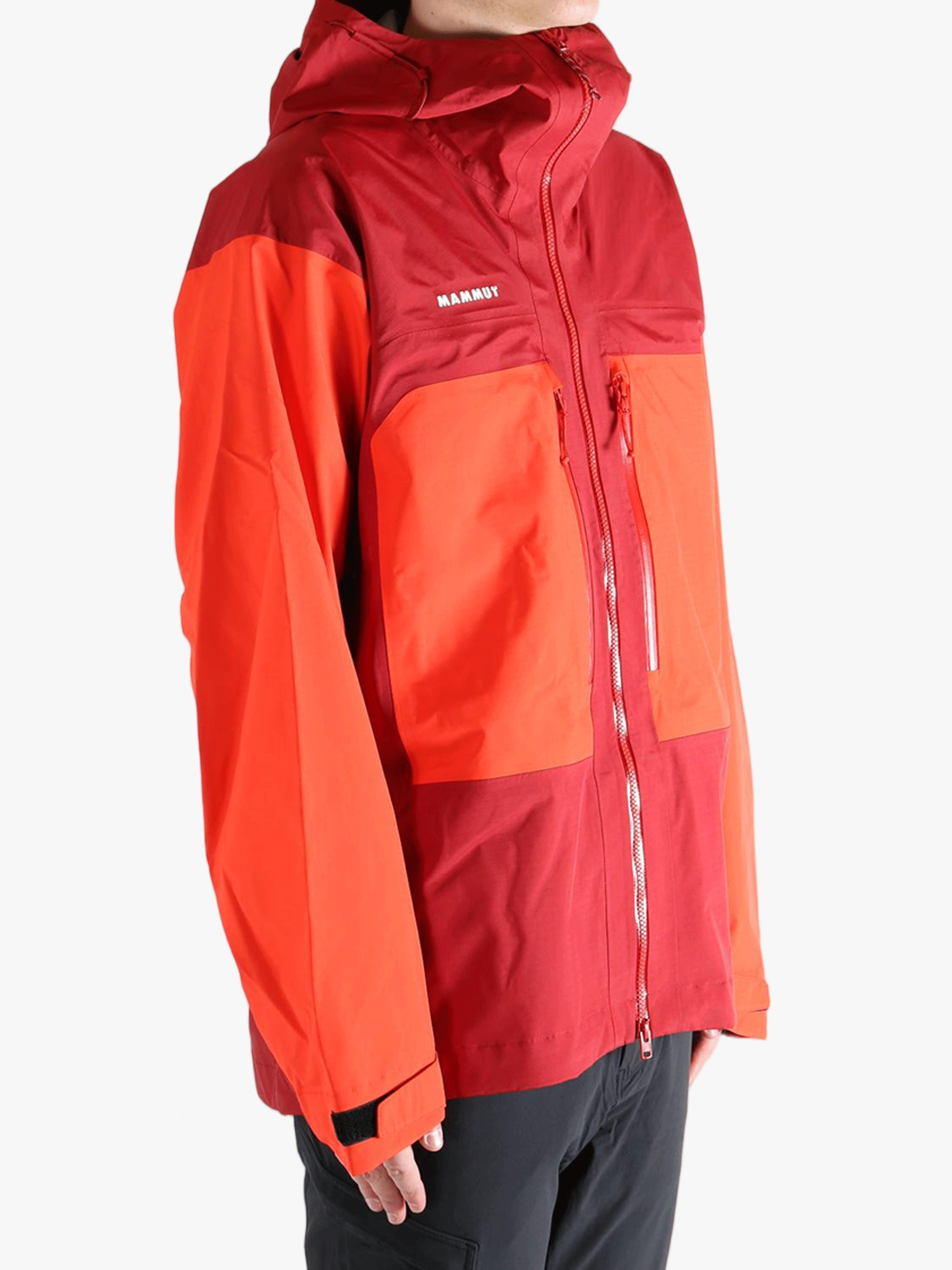 Red and orange jacket worn by a person, showing the jacket fit