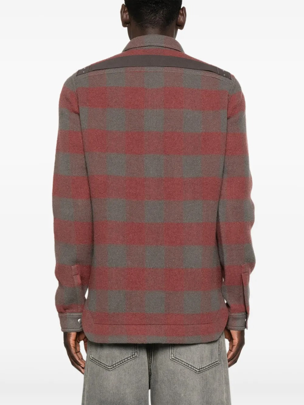 Red shirt worn by a person, showing the shirt's fit