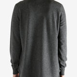 Grey shirt worn by a person, showing the shirt's fit