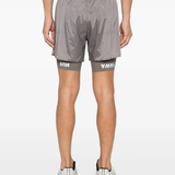 Gray shorts worn by a person, showing the shorts fit