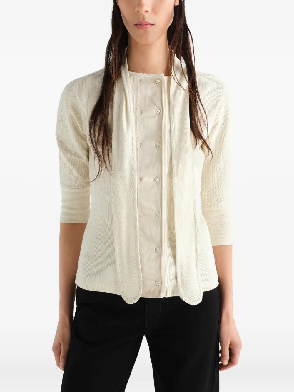 Tan t-shirt worn by a person, showing the t-shirt fit