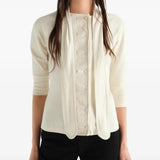 Tan t-shirt worn by a person, showing the t-shirt fit