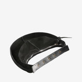 Close up of the black bag, showing texture of the leather fabric