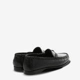 Black loafer, back view