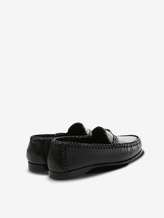 Black loafer, back view