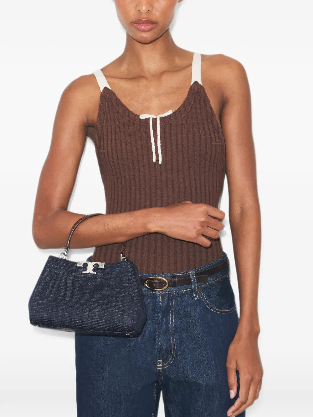 Navy bag worn by a person, showing the bag fit