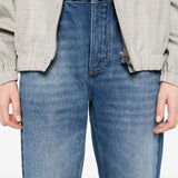 Close up of blue jeans, showing texture of the cotton fabric