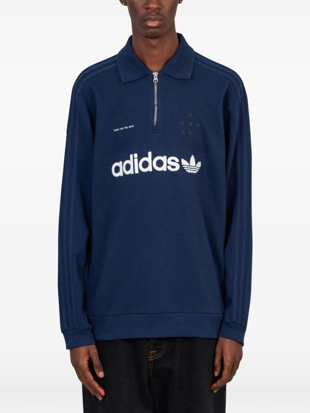 Navy shirt worn by a person, showing the shirt fit