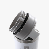 Close up of white cup, showing the detail of the lid