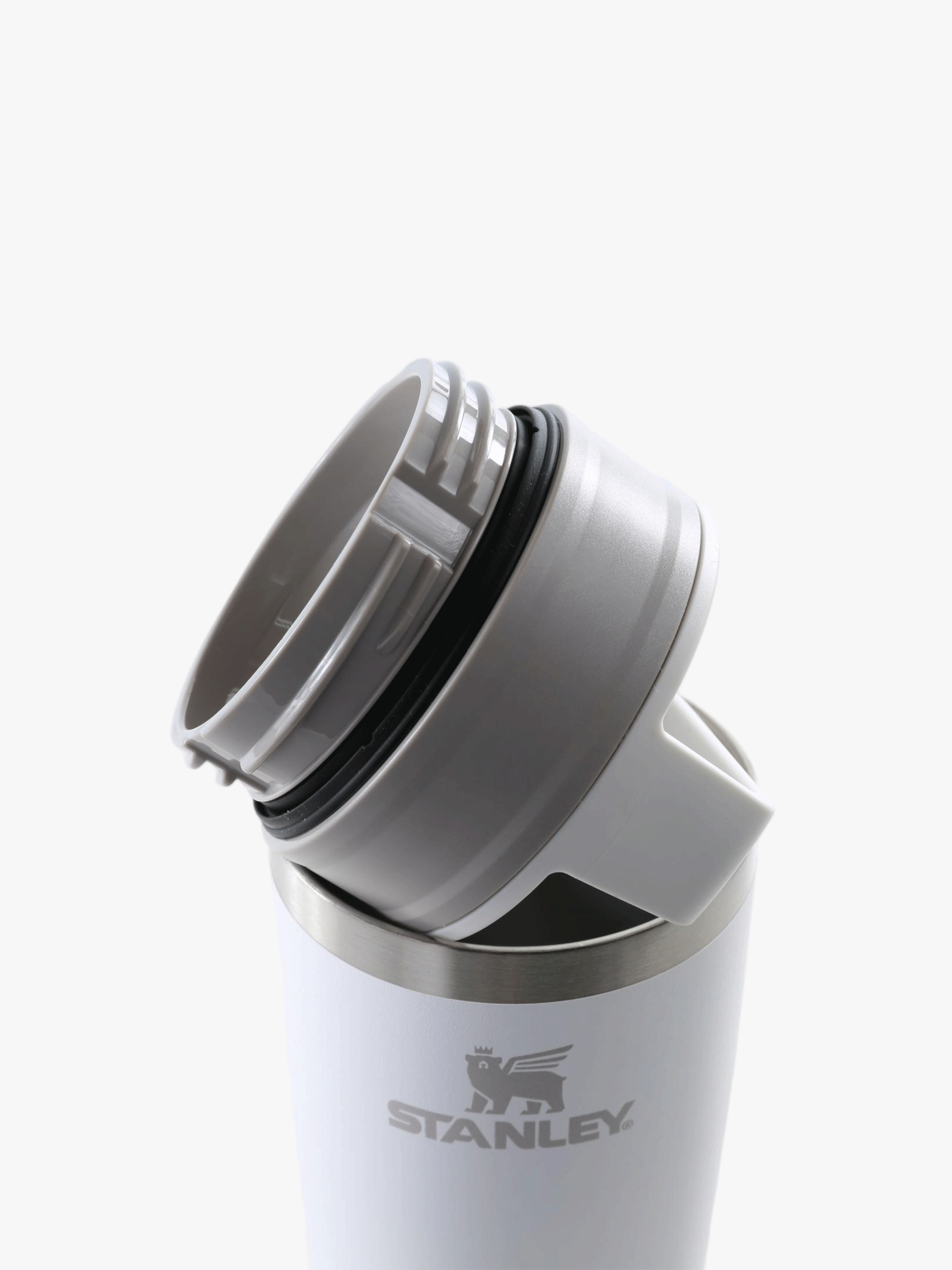 Close up of white cup, showing the detail of the lid