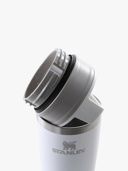Close up of white cup, showing the detail of the lid