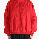 Red jacket worn by a person,showing the jacket fit
