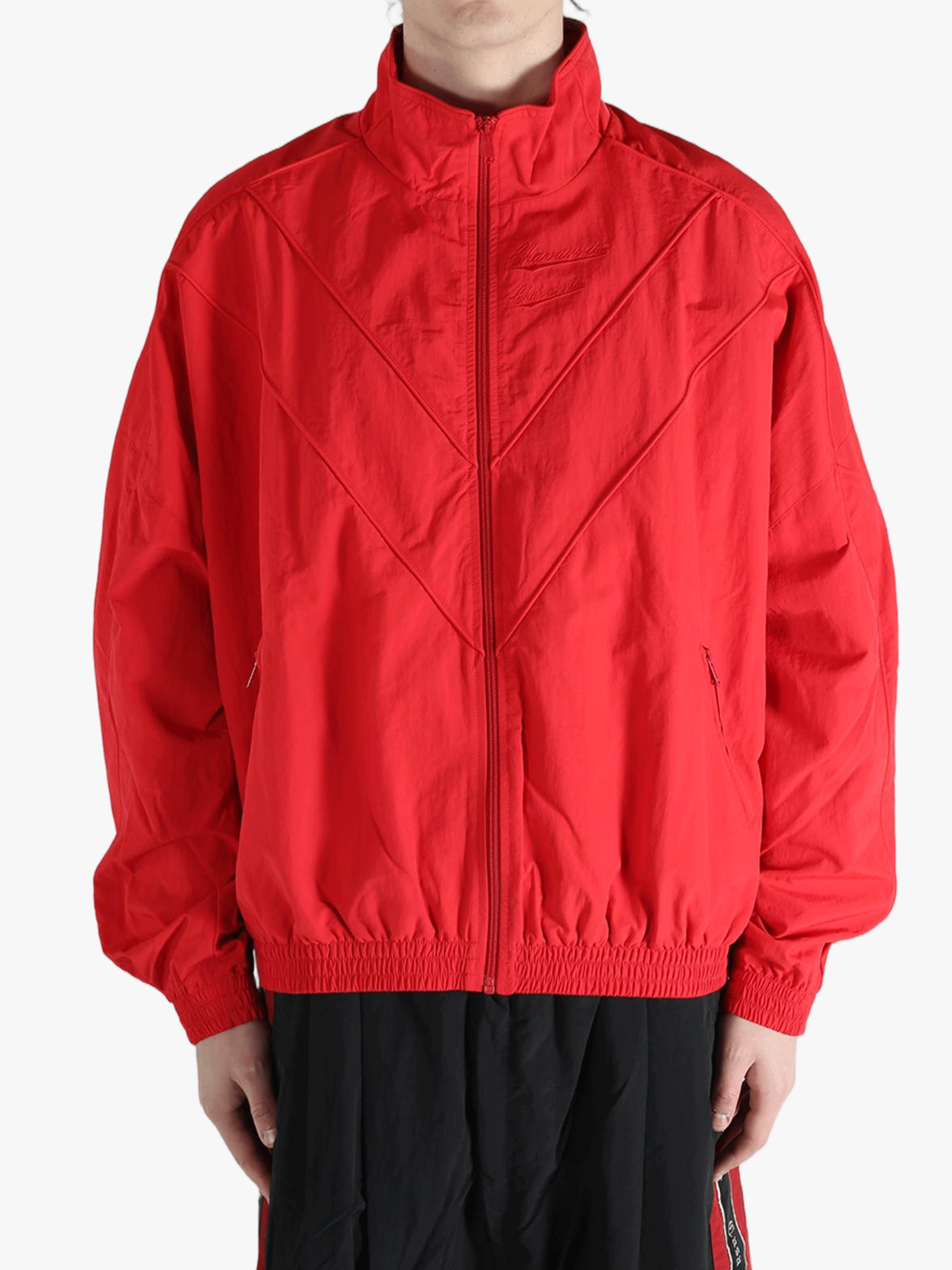 Red jacket worn by a person,showing the jacket fit