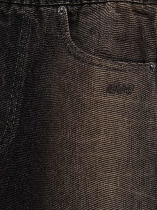 Close up of Black pants, showing texture of the cotton fabric
