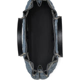 Close up of the blue bag, showing texture of the cotton fabric