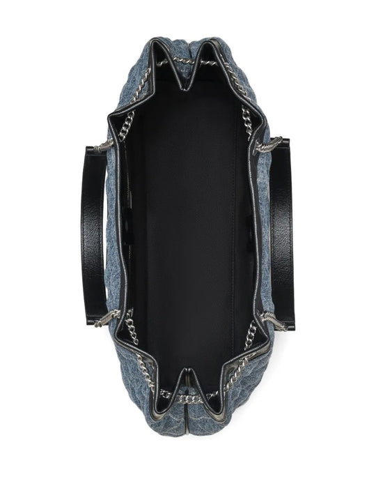 Close up of the blue bag, showing texture of the cotton fabric