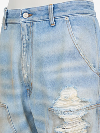 Close up of the blue jean, showing texture of the cotton fabric