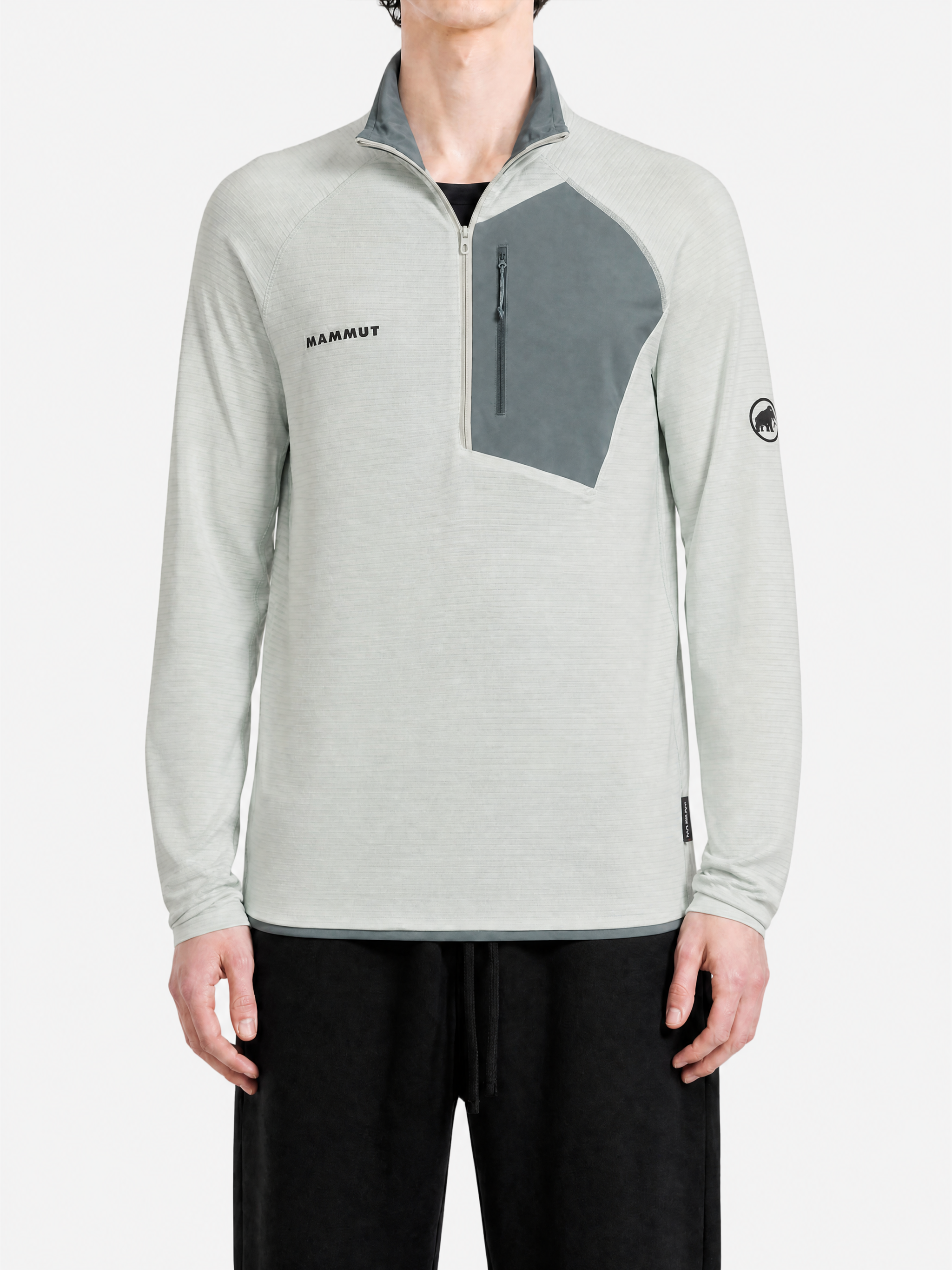 Grey hoodie worn by a person, showing the hoodie fit