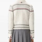 white knitwear worn by a person, showing the knitwear fit