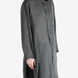 Black shirt,worn by a person, showing the shirt's fit