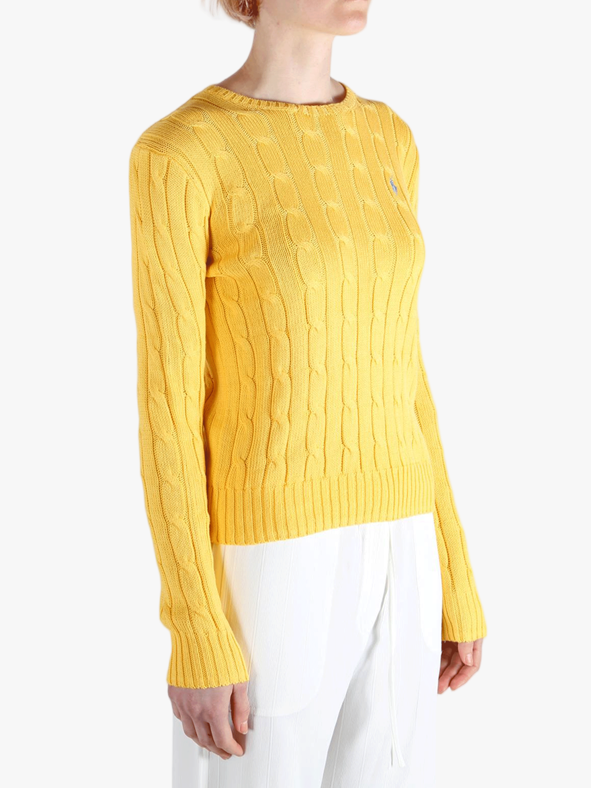 Yellow cardigan worn by a person, showing the cardigan's fit