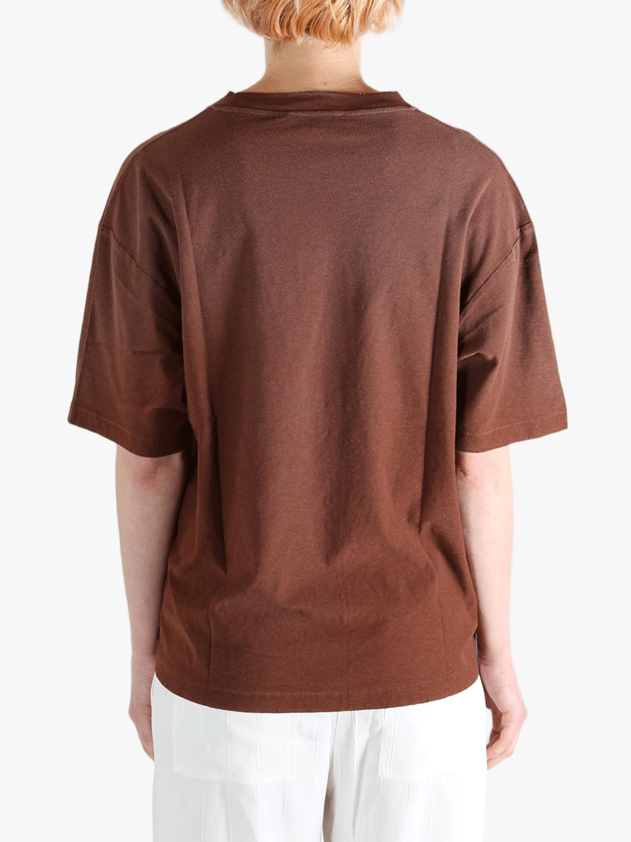Brown t-shirt worn by a person, showing the t-shirt fit