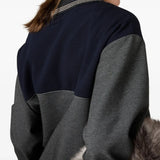 Close up of the grey sweatshirt, showing texture of the viscose fabric