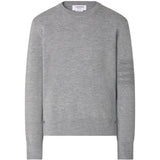 Grey knitwear, front view