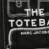 Close up of black bag, showing texture of the cotton fabric