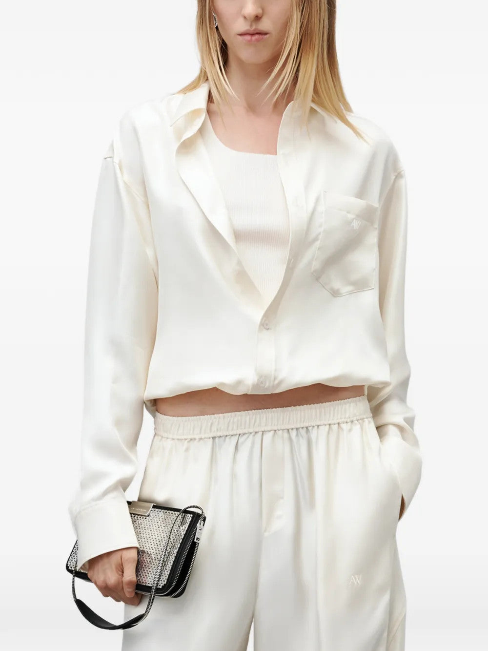 Tan top worn by a person, showing the top fit