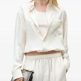 Tan top worn by a person, showing the top fit