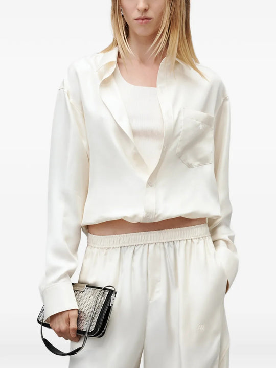 Tan top worn by a person, showing the top fit