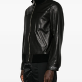 Black jacket worn by a person, showing the jacket fit