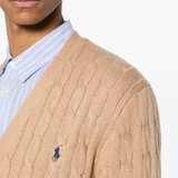 Close up of tan cardigan,showing texture of the cotton fabric